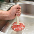 What do professionals use to unclog drains?