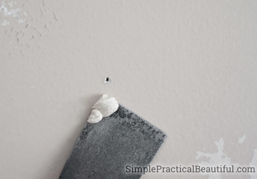 Who to call to fix holes in a wall?