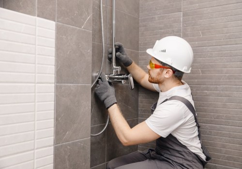 What safety precautions do you take to ensure safety while working at a plumbing site?